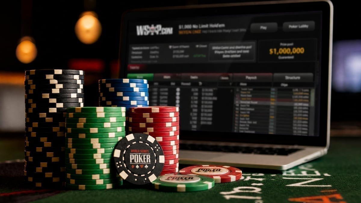 Tournament chips with online poker lobby in background