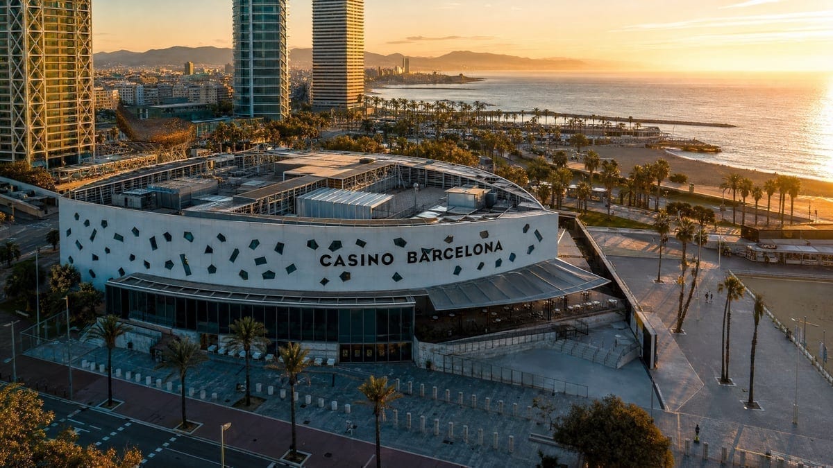 Casino Barcelona exterior with Port Olympic marina in background