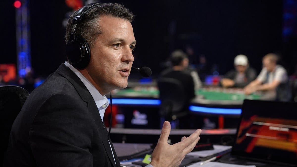 Professional poker commentator at work during major tournament broadcast
