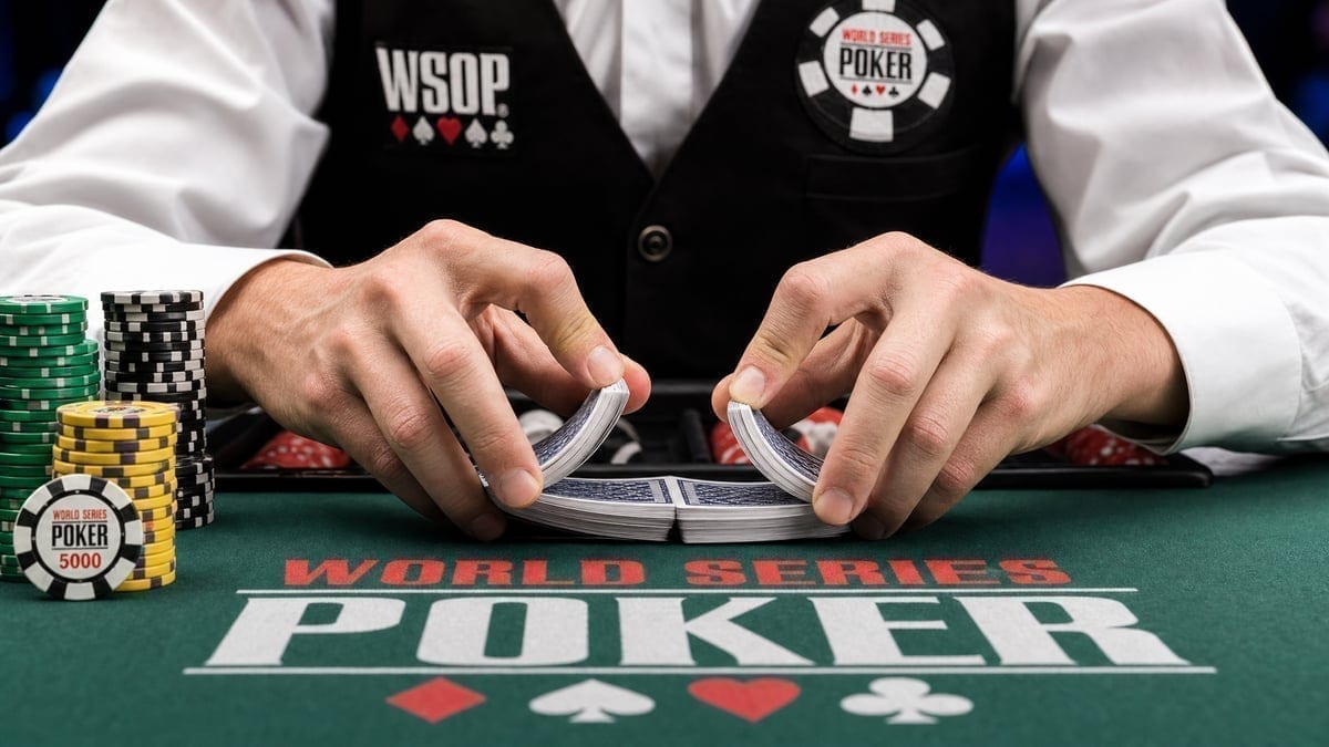 Dealer shuffling cards at WSOP tournament table